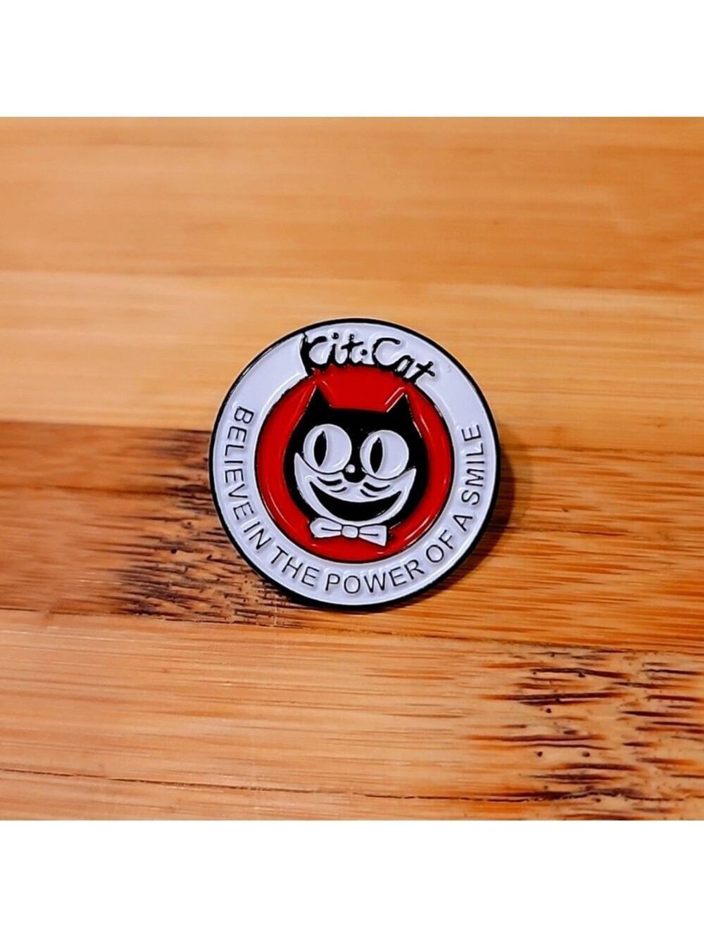 Kit-Cat Klock enamel pin